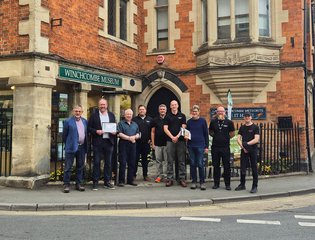 Duracell Energy & Winchcombe Town Trust and Councillor David Gray outside Winchcombe Museum